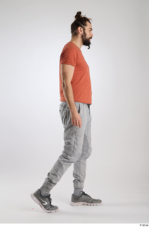Turgen 1 casual dressed grey sneakers grey trousers orange t-shirt…